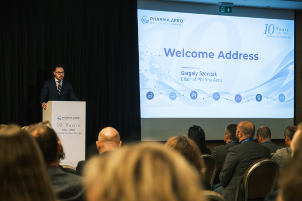 Gergely Szorcsik speaking at the Pharma.Aero 10th Anniversary Symposium in Brussels